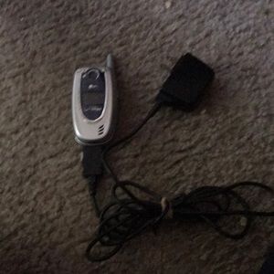 Flip phone charger in included just need SIM card  for it